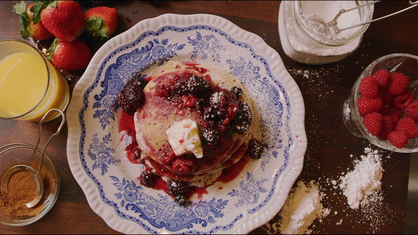 Pancakes with fruit and butter