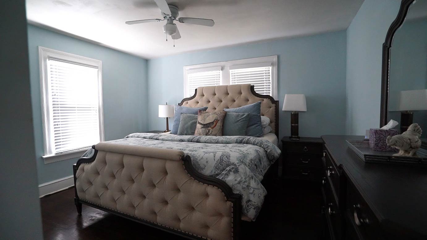 Bedroom with huge blue bed